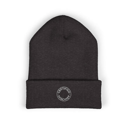 A cuffed beanie embroidered with the circular text "CERTIFIED MISCHIEF" on a cozy winter hat - WishBug