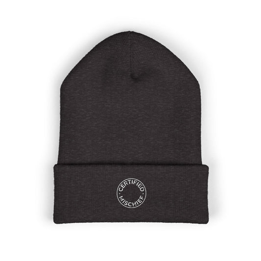 A cuffed beanie embroidered with the circular text "CERTIFIED MISCHIEF" on a cozy winter hat - WishBug