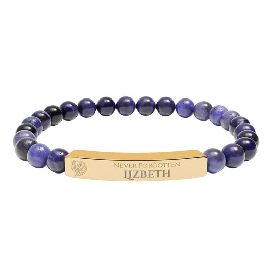 A natural stone bead engraved bracelet, personalized, with the text "Never Forgotten" with engraved elephant