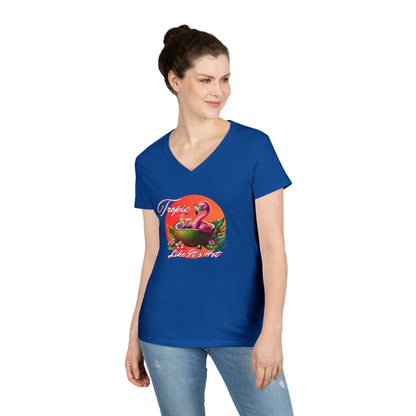 Flamingo V-Neck Tee featuring a sunset and a flamingo lounging in a coconut with a cocktail, text “Tropic Like It’s Hot”